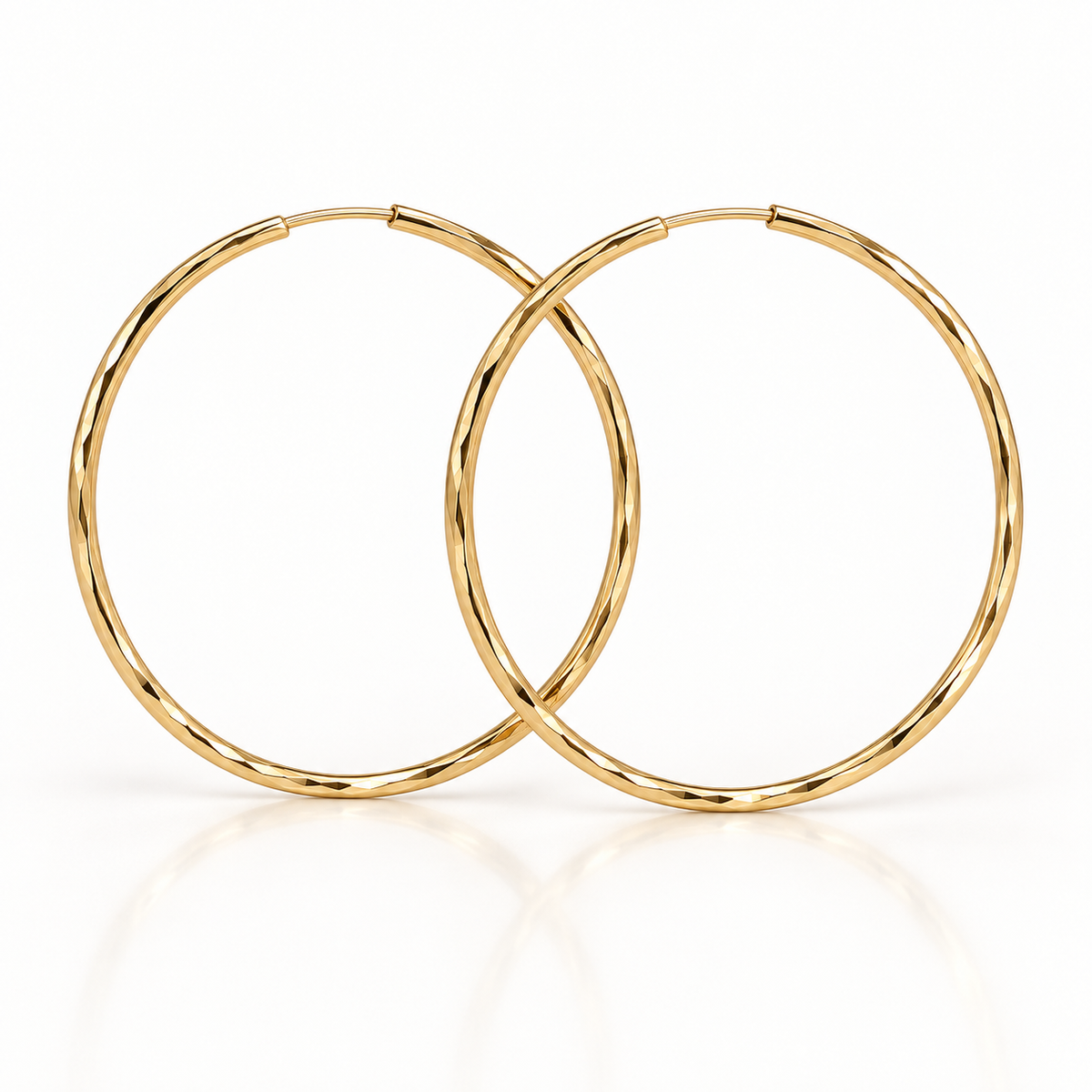 Pair of 41mm diamond-cut hoop earrings crafted in 14K solid yellow gold
