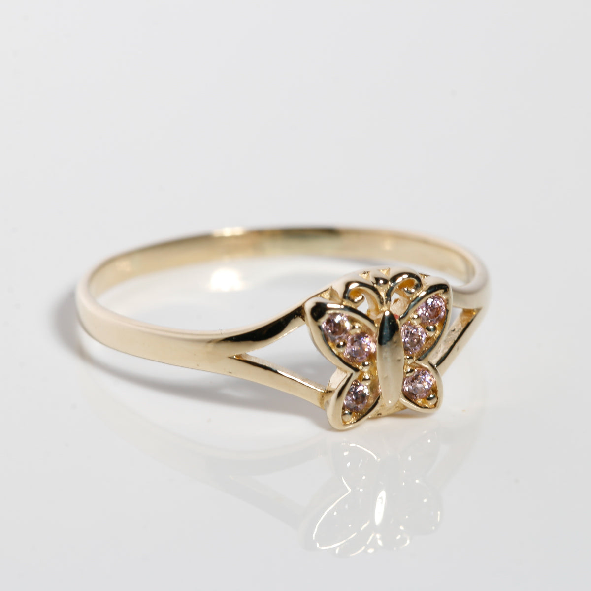 Side view of 14K solid gold butterfly ring with pink stones