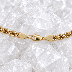 Triangular end terminals and lobster clasp on a solid 14K gold rope chain